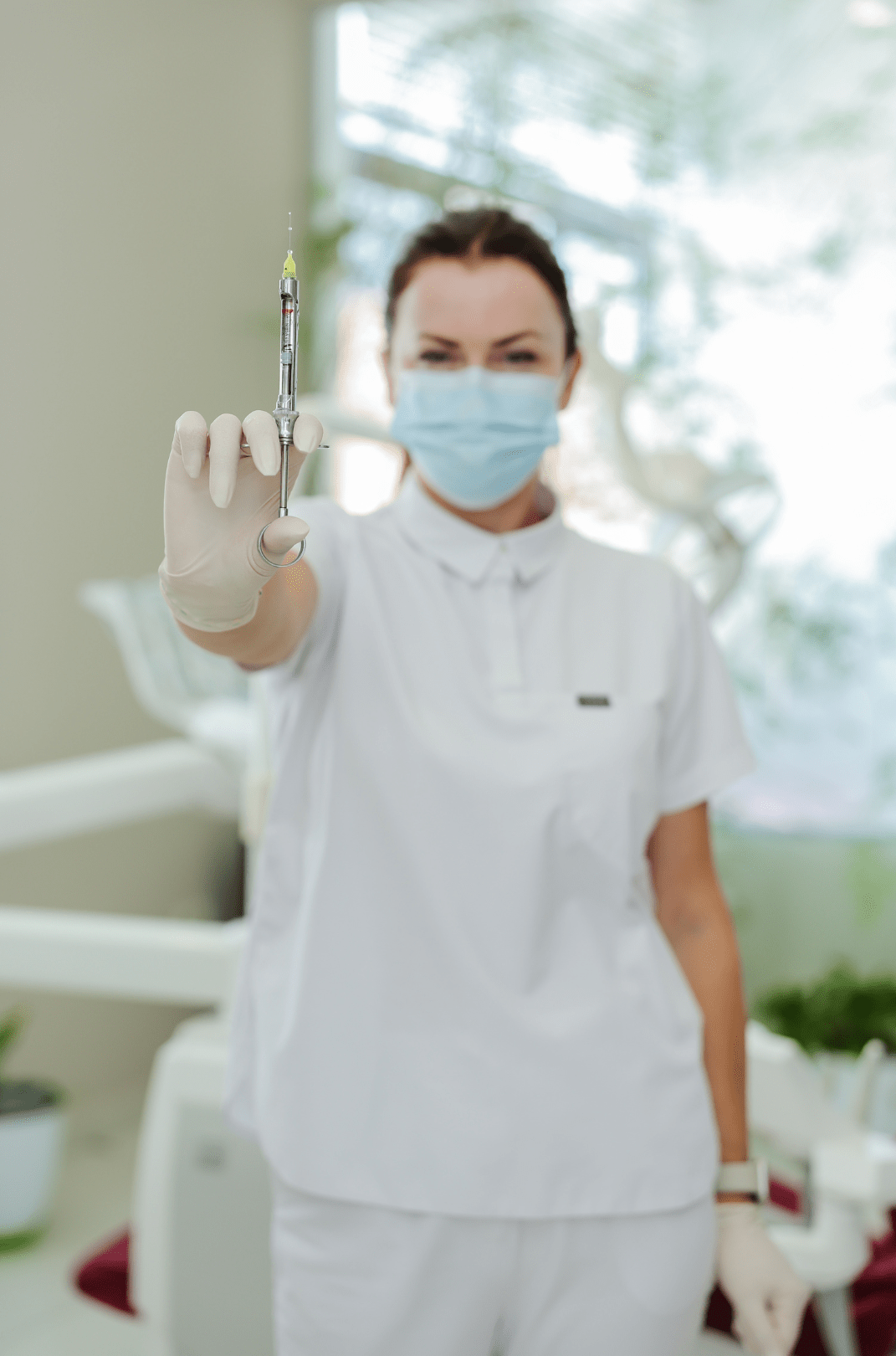 Dr. Elsa Metalla showing tools for treatment